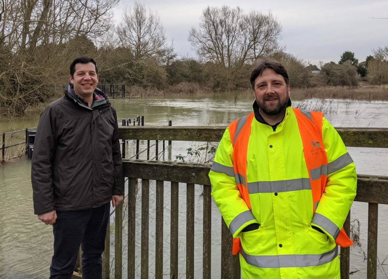 Andrew Coles and Mike Brooker working to prevent flooding