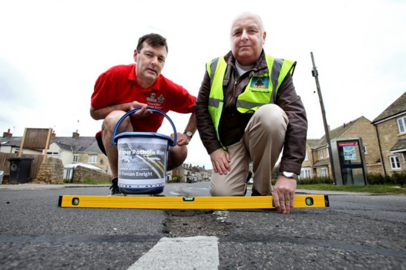 Councillor Duncan Enright with "Mr Pothole"