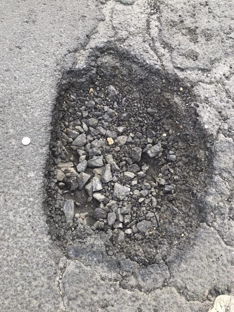 A picture of a pot hole on the Smith